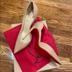 Christian Louboutin nude heels.